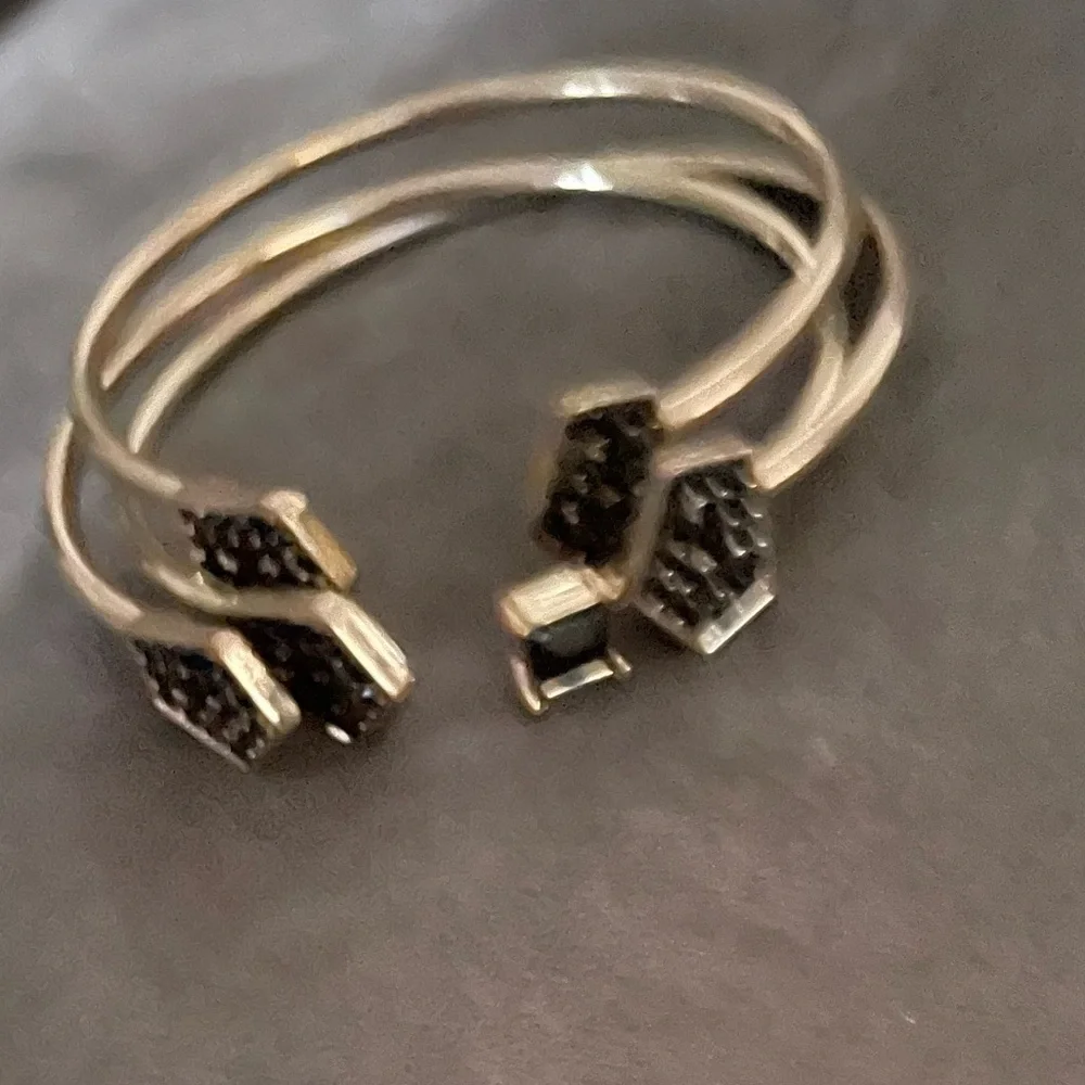 Set of 3 gold and black bangle bracelets